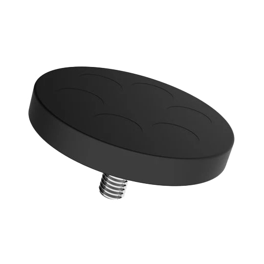 Rubber-coated neodymium magnet from below, the 43 mm black rubber face with its magnet disc outlines