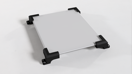 Angled view of a Starlink V5 dish lying face up in the roof mount's four corner brackets