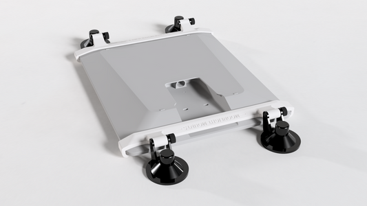 Starlink V5 suction cup mount laid flat, close angled view of the locking suction cups and low-profile rails